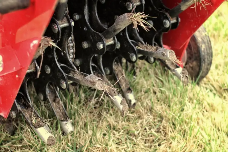 Close up image of core aeration machine.