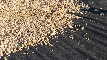 Rocks on top of landscape fabric