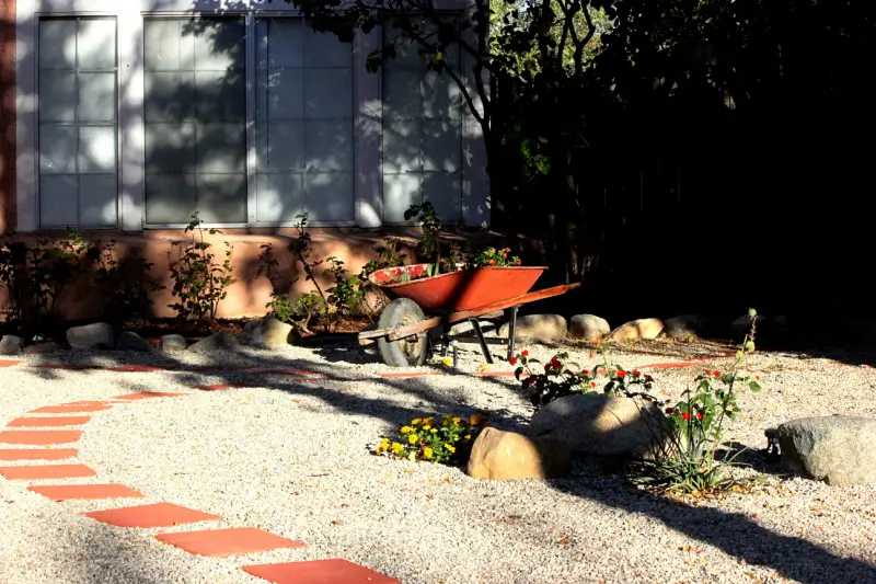 Xeriscaped front yard with a pathway.