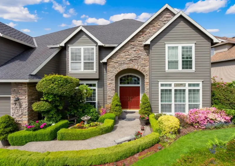 House with walkway up to the front door.