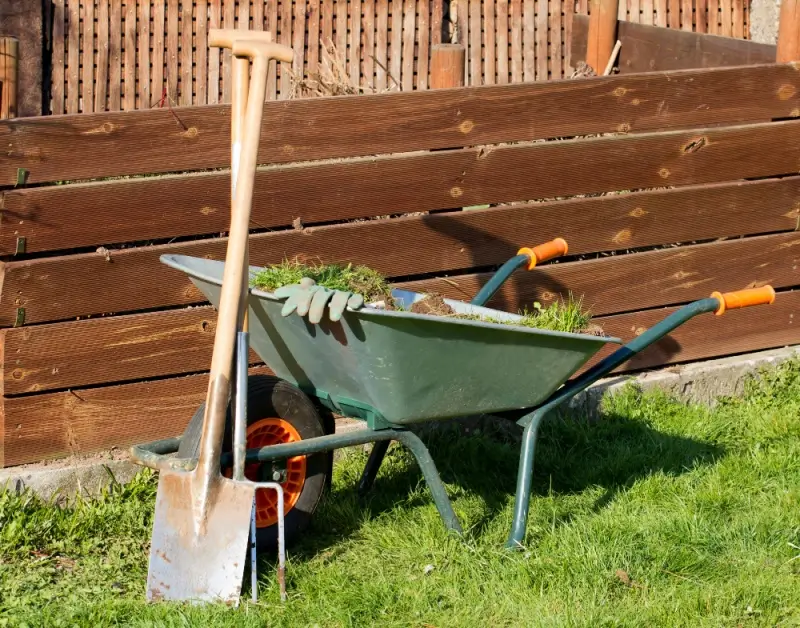 Equipment for topdressing a lawn.