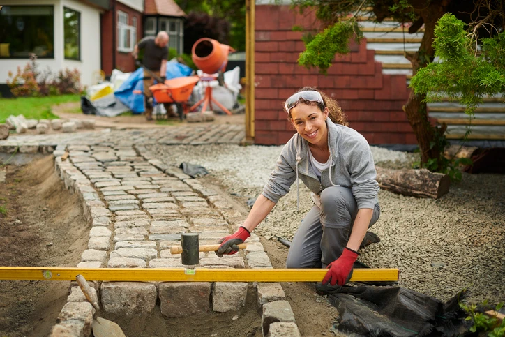 woman installing path