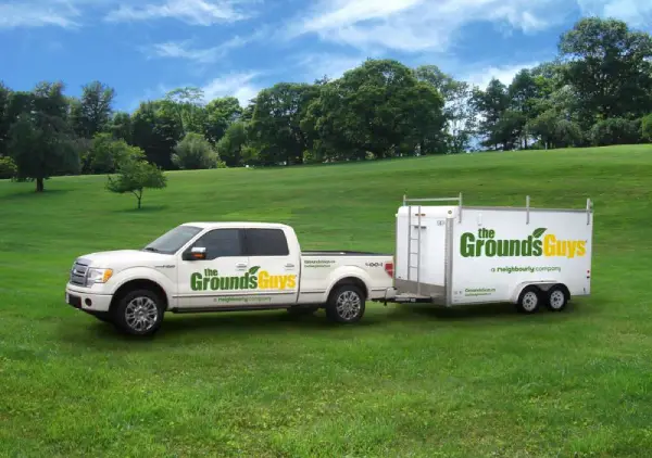 Grounds Guys truck for sod installation 