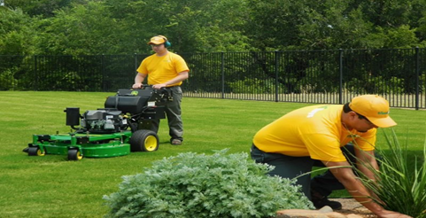 Grounds Guys commercial lawn mowing and edging.